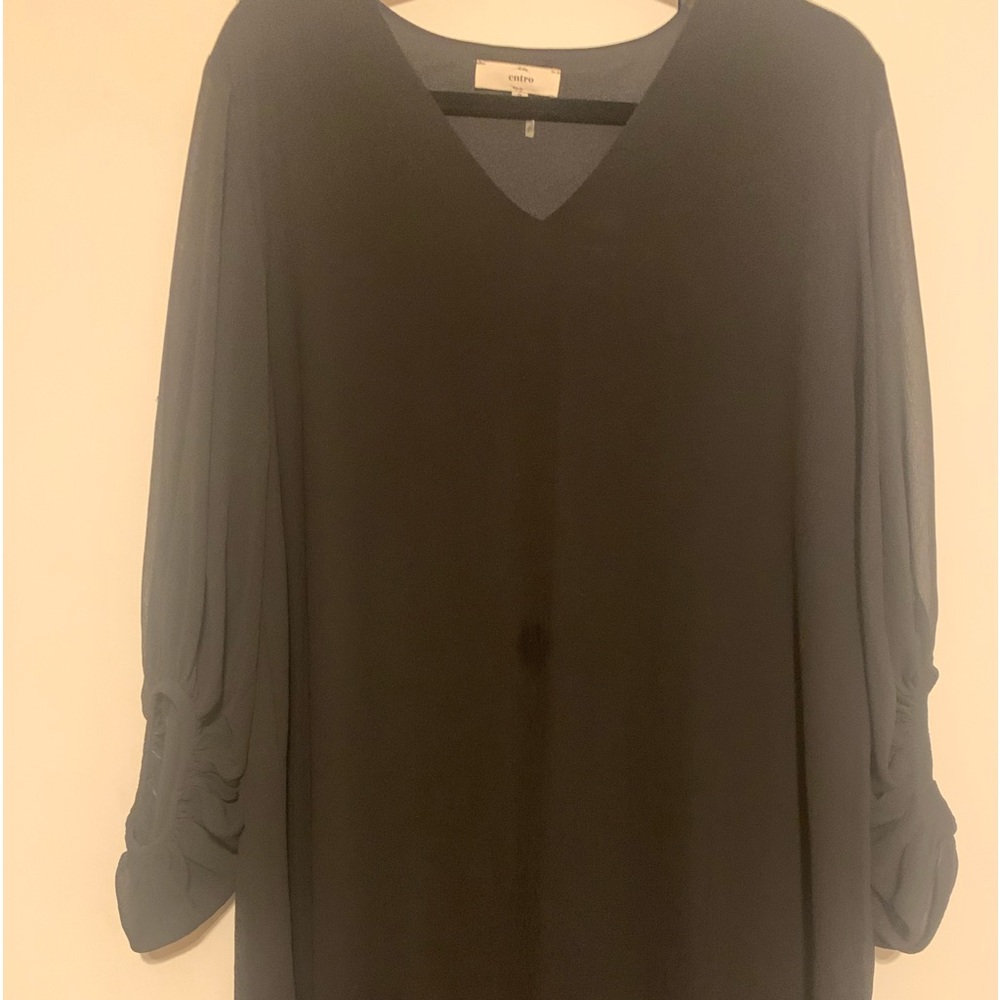 Above Knee Black flowing dress with bell sleeves. Sheer that is fully lined